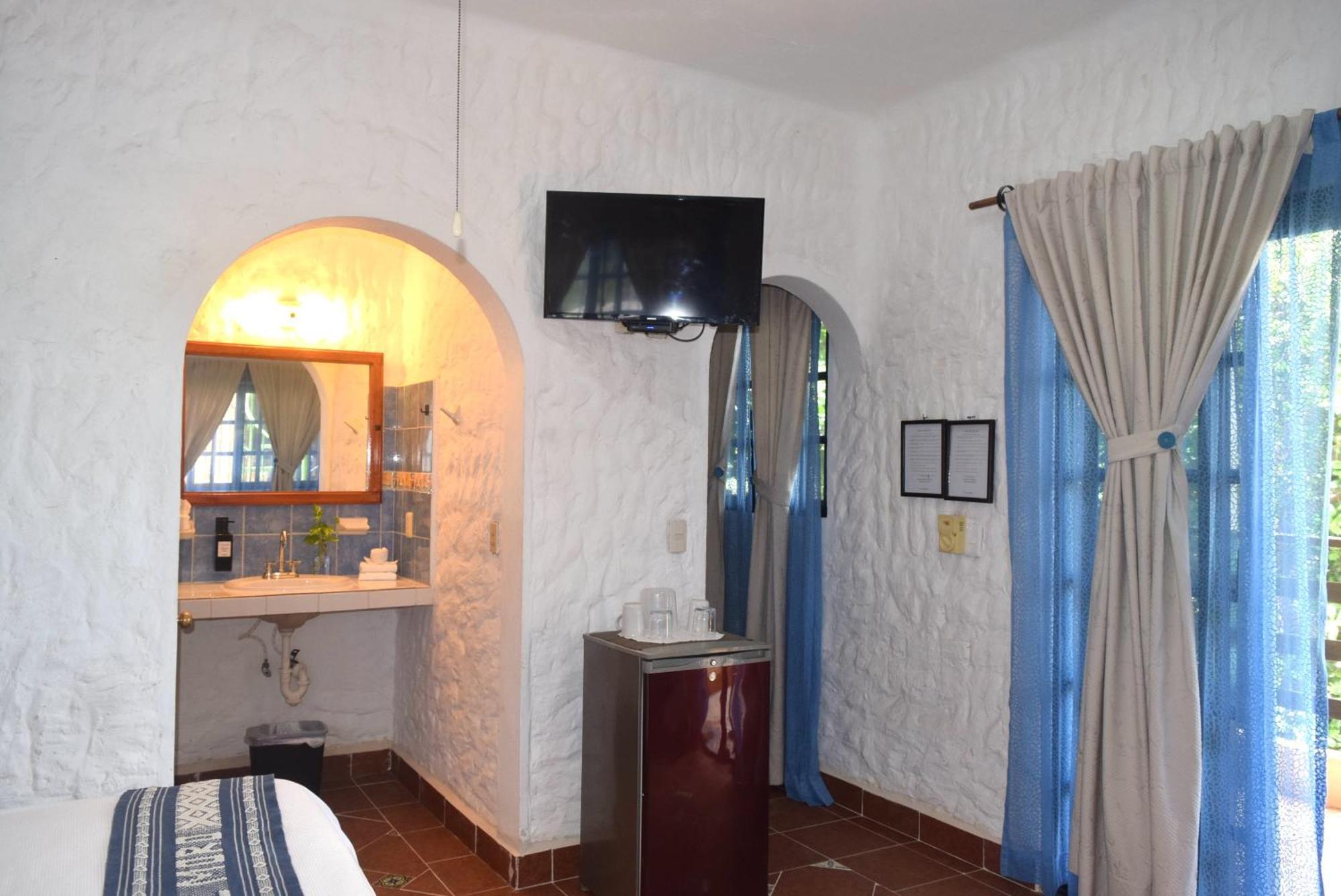 Hotel Casa El Moro ปัวร์โตโมเรลอส ห้อง รูปภาพ